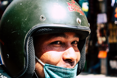 Kathmandu Nepal September 13, 2018 Portrait of unknown Nepalese people walking in the street of Kathmandu in the afternoonのeditorial素材