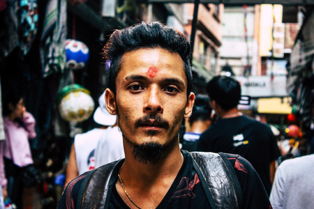 Kathmandu Nepal September 13, 2018 Portrait of unknown Nepalese people walking in the street of Kathmandu in the afternoonのeditorial素材