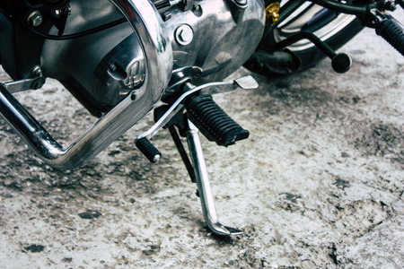Pokhara Nepal September 18, 2018 Closeup of an Royal Enfield motorcycle parked in New road street Lakeside in Pokhara in the morningのeditorial素材