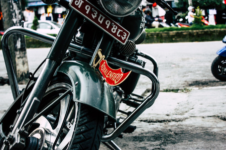 Pokhara Nepal September 18, 2018 Closeup of an Royal Enfield motorcycle parked in New road street Lakeside in Pokhara in the morningのeditorial素材