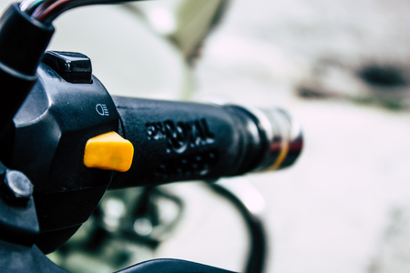 Pokhara Nepal September 18, 2018 Closeup of an Royal Enfield motorcycle parked in New road street Lakeside in Pokhara in the morningのeditorial素材
