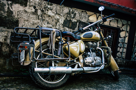 Pokhara Nepal September 18, 2018 Closeup of a Royal Enfield motorcycle parked in the street of Pokhara in the afternoonのeditorial素材