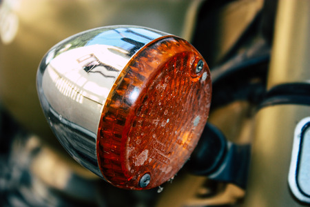 Pokhara Nepal September 18, 2018 Closeup of a Royal Enfield motorcycle parked in the street of Pokhara in the afternoonのeditorial素材