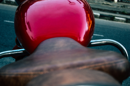 Pokhara Nepal September 18, 2018 Closeup of a Royal Enfield motorcycle parked in the street of Pokhara in the afternoonのeditorial素材