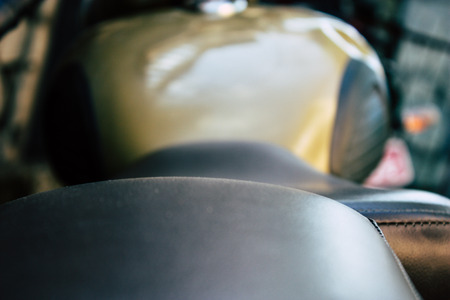 Pokhara Nepal September 18, 2018 Closeup of a Royal Enfield motorcycle parked in the street of Pokhara in the afternoonのeditorial素材