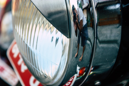 Pokhara Nepal September 18, 2018 Closeup of a Royal Enfield motorcycle parked in the street of Pokhara in the afternoonのeditorial素材