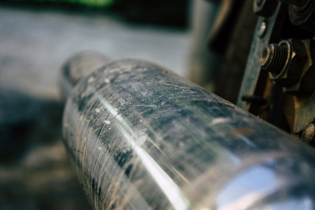 Pokhara Nepal September 18, 2018 Closeup of a Royal Enfield motorcycle parked in the street of Pokhara in the afternoonのeditorial素材