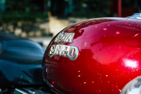Pokhara Nepal September 18, 2018 Closeup of a Royal Enfield motorcycle parked in the street of Pokhara in the afternoonのeditorial素材