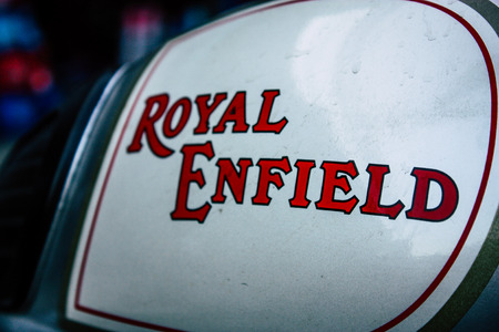 Pokhara Nepal September 18, 2018 Closeup of a Royal Enfield motorcycle parked in the street of Pokhara in the afternoonのeditorial素材