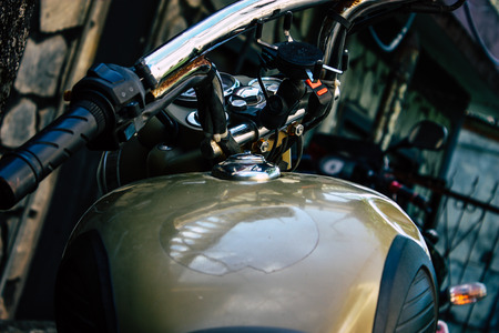 Pokhara Nepal September 18, 2018 Closeup of a Royal Enfield motorcycle parked in the street of...