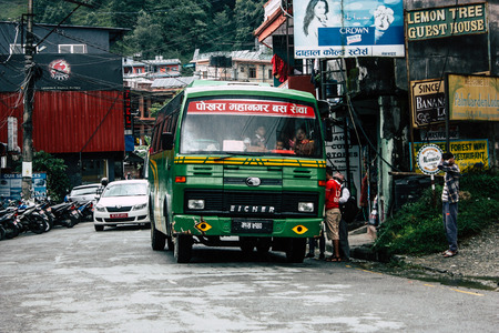 Pokhara Nepal September 18, 2018 Closeup of a Nepali local bus at New road street in Pokhara in the morningのeditorial素材