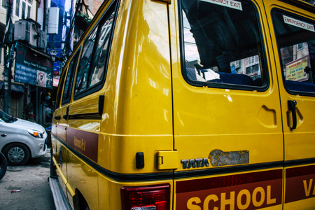 Pokhara Nepal September 18, 2018 View of a traditional yellow school bus rolling in Pokhara in the...