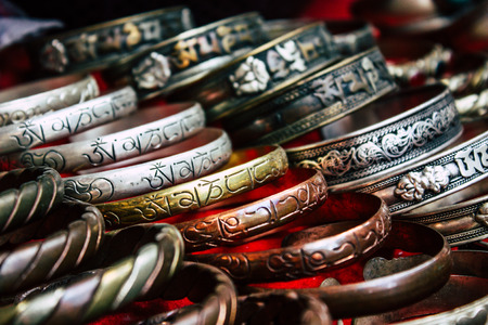 Pokhara Nepal September 18, 2018 Closeup of traditional Nepali decorative objects sold in a souvenir shop in Pokhara in the morningのeditorial素材