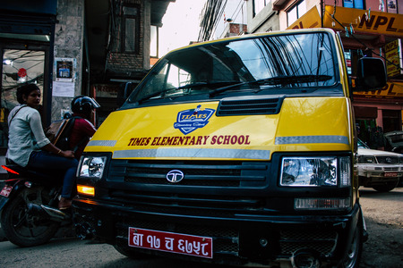 Pokhara Nepal September 18, 2018 View of a traditional yellow school bus rolling in Pokhara in the...