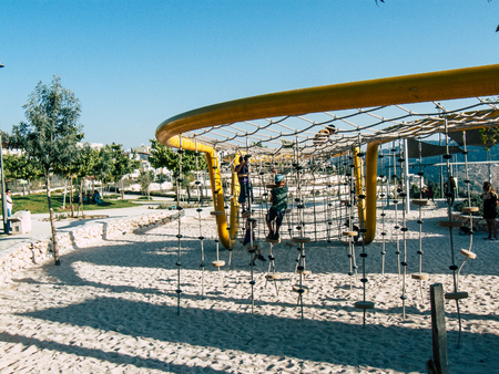 Jerusalem Israel September 11, 2018 View of kids playing in a public garden in Jerusalem in the afternoonのeditorial素材