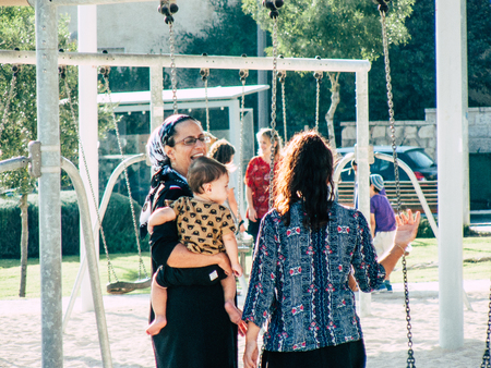 Jerusalem Israel September 11, 2018 View of kids playing in a public garden in Jerusalem in the afternoonのeditorial素材