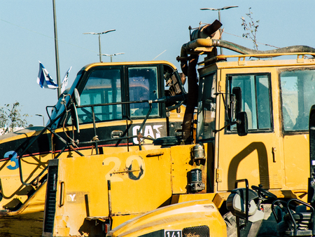 Jerusalem Israel September 10, 2018 View of a yellow truck in a construction site near Jerusalem in the afternoonのeditorial素材