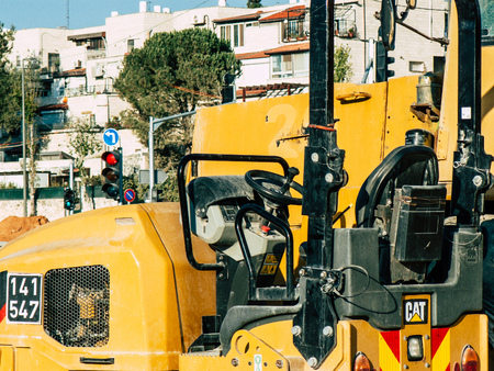 Jerusalem Israel September 10, 2018 View of a yellow truck in a construction site near Jerusalem in the afternoonのeditorial素材