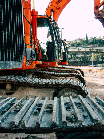 Jerusalem Israel September 10, 2018 View of a yellow truck in a construction site near Jerusalem in the afternoonのeditorial素材