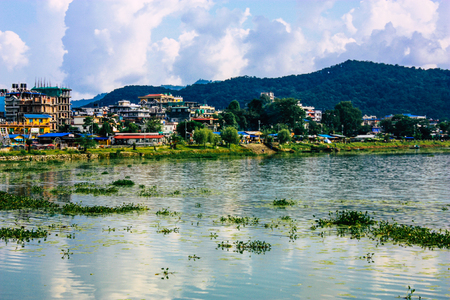 Pokhara Nepal September 18, 2018 View of the town of Pokhara from the Phewa lake in the morningのeditorial素材