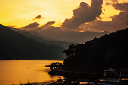 Pokhara Nepal September 18, 2018 View of clouds on the top of the Phewa lake in the eveningのeditorial素材