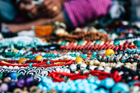 Pokhara Nepal September 26, 2018 Closeup of various handmade jewelry sold by a old woman in the streets of Pokhara in the afternoonの写真素材