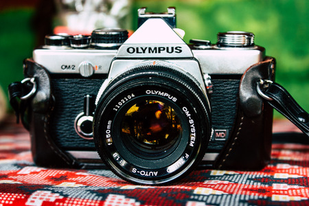 Kathmandu Nepal September 27, 2018 View of an old Olympus camera resting on a wooden table in...