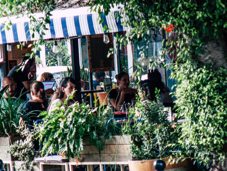 Tel Aviv Israel September 28, 2018 View of unknown Israeli person drinking a glass at Jaffa's Flea...