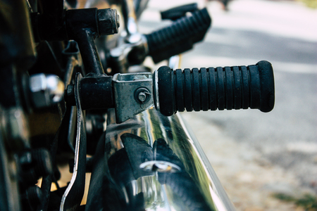 Pokhara Nepal October 6, 2018 View of a Royal Enfield Motorcycle parked front the Phewa lake in Pokhara in the afternoonのeditorial素材