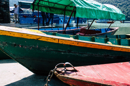 Pokhara Nepal October 9, 2018 View of colorful and traditional Nepalese boats at the Phewa lake of Pokhara in the morningのeditorial素材