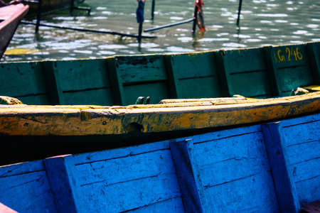 Pokhara Nepal October 9, 2018 View of colorful and traditional Nepalese boats at the Phewa lake of Pokhara in the morningのeditorial素材
