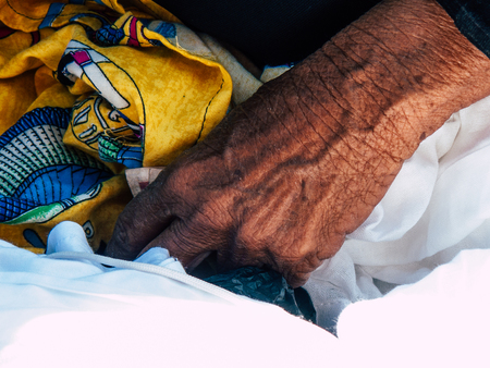 Sinai Egypt October 6, 2018 Portrait of an Arabian woman selling handmade jewelry on the beach in the morningのeditorial素材