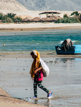 Sinai Egypt October 6, 2018 Portrait of a young Arabian teen walking on the beach in the morningのeditorial素材