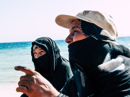 Sinai Egypt October 6, 2018 Portrait of an Arabian woman selling handmade jewelry on the beach in the morningのeditorial素材