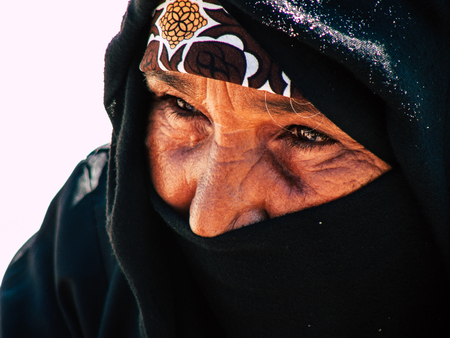 Sinai Egypt October 6, 2018 Portrait of an Arabian woman selling handmade jewelry on the beach in the morningのeditorial素材