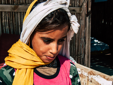 Sinai Egypt October 6, 2018 Portrait of a young Arabian teen walking on the beach in the morningのeditorial素材