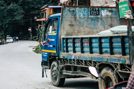 Pokhara Nepal October 12, 2018 View of a traditional Nepali local truck driving in New street at pokhara in the afternoonのeditorial素材