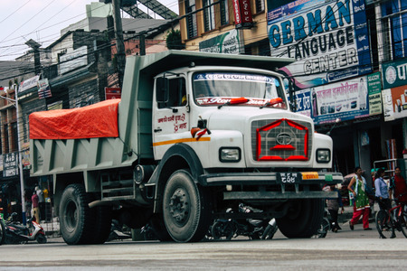 Pokhara Nepal October 12, 2018 View of a traditional Nepali local truck driving in New street at pokhara in the afternoonのeditorial素材