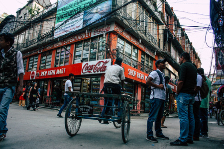 Kathmandu Nepal October 12, 2018 View of unknown Nepali people driving a bicycle in Kathmandu in the morningのeditorial素材