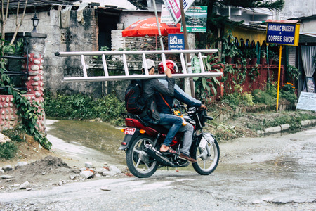 Pokhara Nepal october 12, 2018 View of a motorcycle in the main street of Pokhara in the morningのeditorial素材