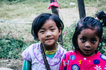 Bandipur Nepal October  15, 2018 Closeup of young children playing and having fun together in Bandipur in the afternoonのeditorial素材