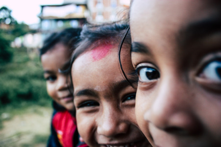 Bandipur Nepal October  15, 2018 Closeup of young children playing and having fun together in Bandipur in the afternoonのeditorial素材
