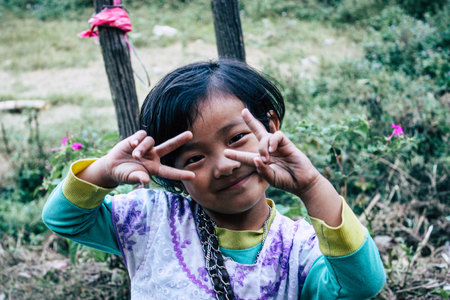 Bandipur Nepal October  15, 2018 Closeup of young children playing and having fun together in Bandipur in the afternoonのeditorial素材