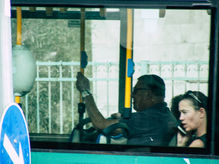 Jerusalem Israel October 15, 2018 Closeup of a local Israeli city bus rolling in the street of Jerusalem in the afternoonのeditorial素材