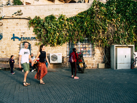 Tel Aviv Yafo Israel October 25, 2018  View of unknown people walking along the Old Jaffa port located in the southern part of Tel Aviv in the afternoonのeditorial素材