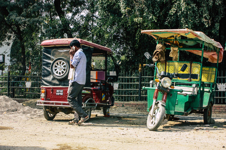 Lumbini Nepal November 3, 2018 View of a rickshaw parked near the entry of the Buddha Garden in Lumbini in the afternoonのeditorial素材