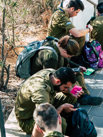 Tel Aviv Israel November 3, 2018  View of unknown Israeli passengers traveling by train at the Tel Aviv University train station in the afternoonのeditorial素材