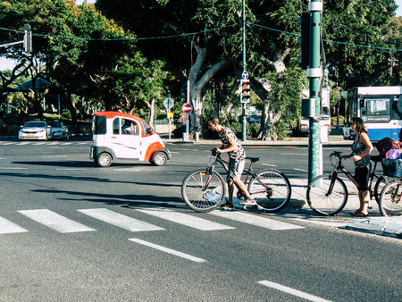Tel Aviv Israel October 25, 2018  View of unknown Israeli people with a bicycle in the streets of...