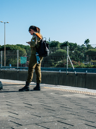 Tel Aviv Israel November 3, 2018  View of unknown Israeli passenger traveling by train at the Tel Aviv University train station in the afternoonのeditorial素材