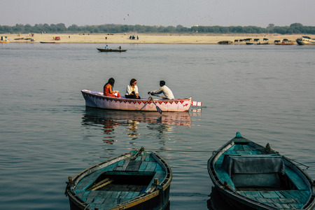 Varanasi India November 8, 2018 View of unknowns tourists boating at the Ganga river in the afternoonのeditorial素材